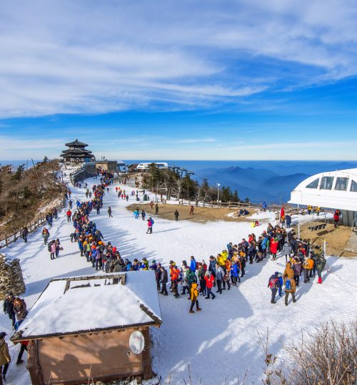 DEOGYUSAN,KOREA - JANUARY 1: Tourists taking photos of the beautiful scenery and skiing around Deogyusan,South Korea on January 1, 2016.
